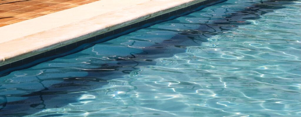 ladder into swimming pool summer background 1 3